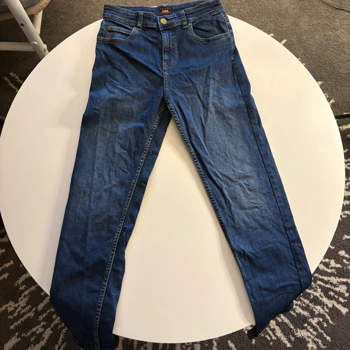 Blå slim fit jeans från Lee