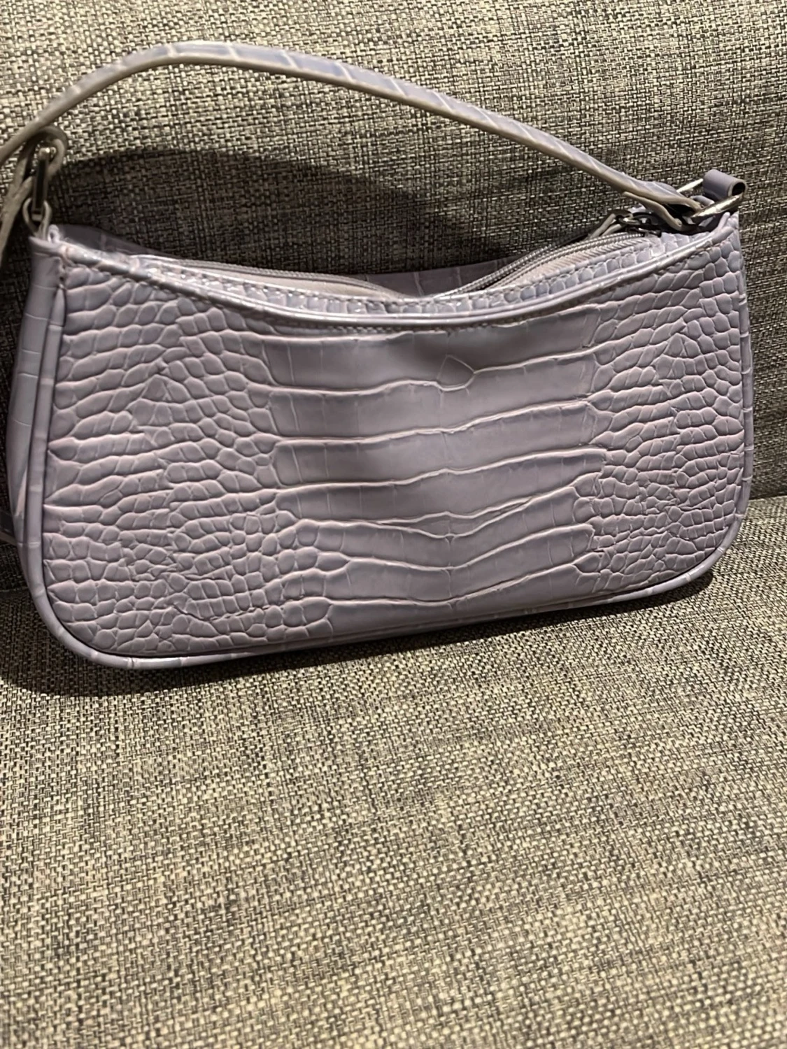 Ljuslila/lilac väska från monki