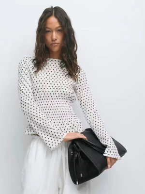 Prickig topp från Ginatricot  - Slutsåld prickig topp från ginatricot, storlek xs. Endast andvänd 1 gång.