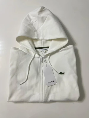 Lacoste tröja - Aldrig använd 