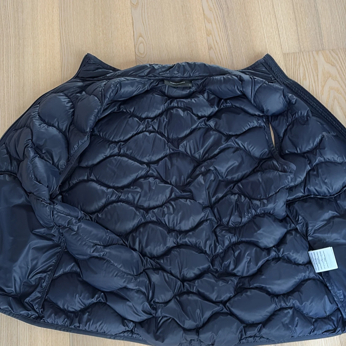 Mörkblå dunväst Peak Performance - 1
