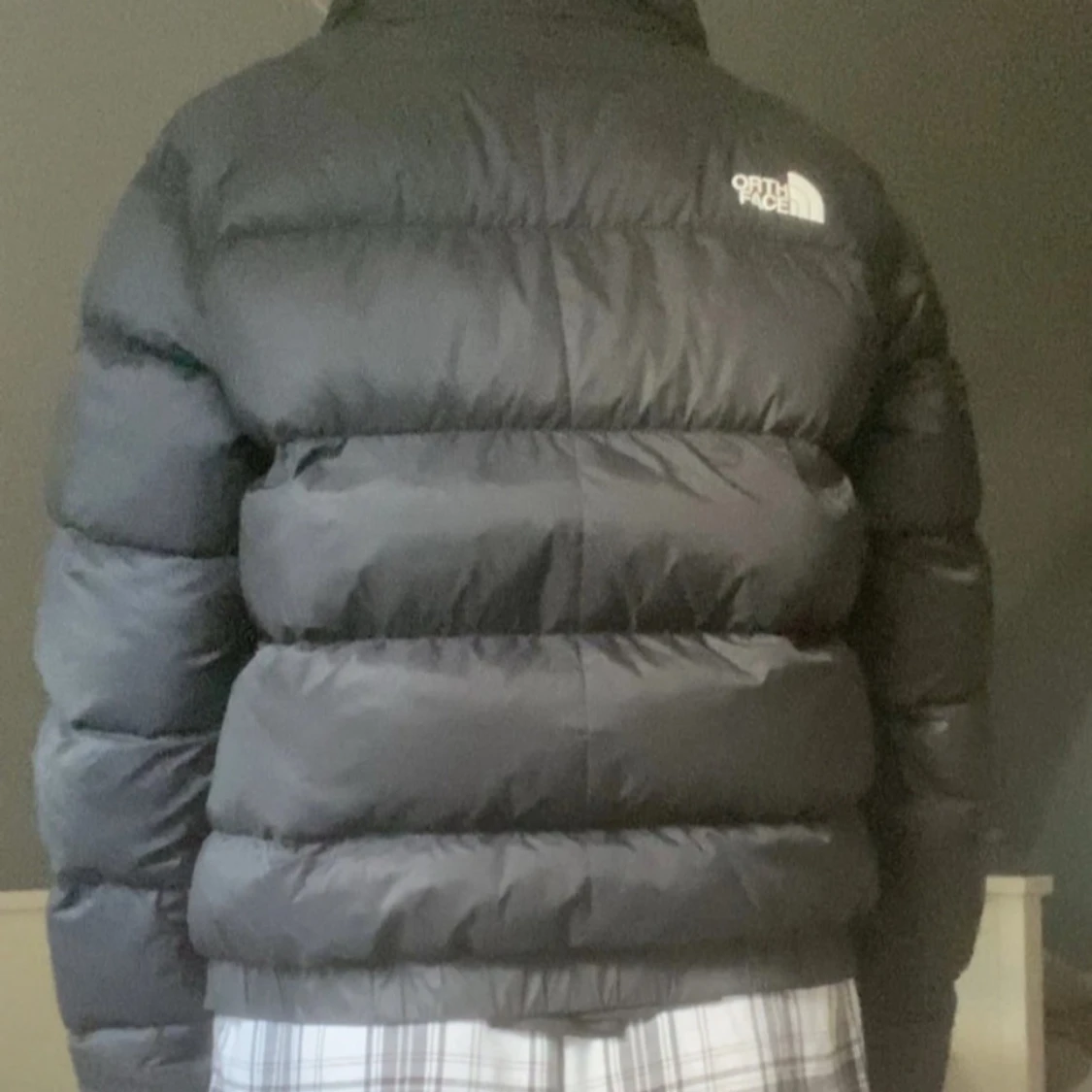 Svart dunjacka från The North Face M - 1