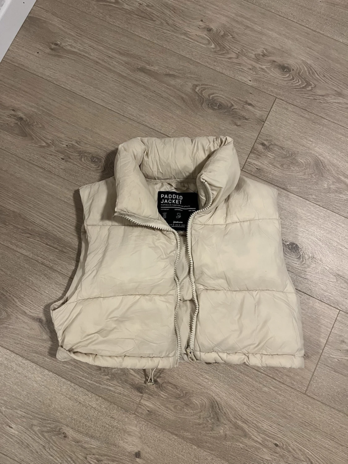 Beige dunväst med dragkedja - 1