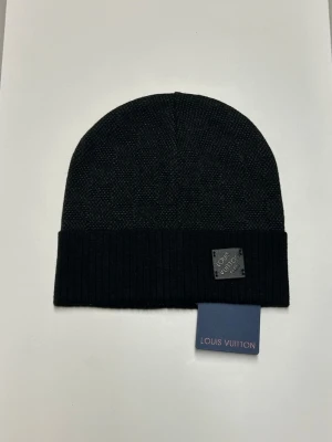 Lv Mössa - Helt ny aldrig använd. Storlek One size. Snabb frakt fraktar inom 24h.