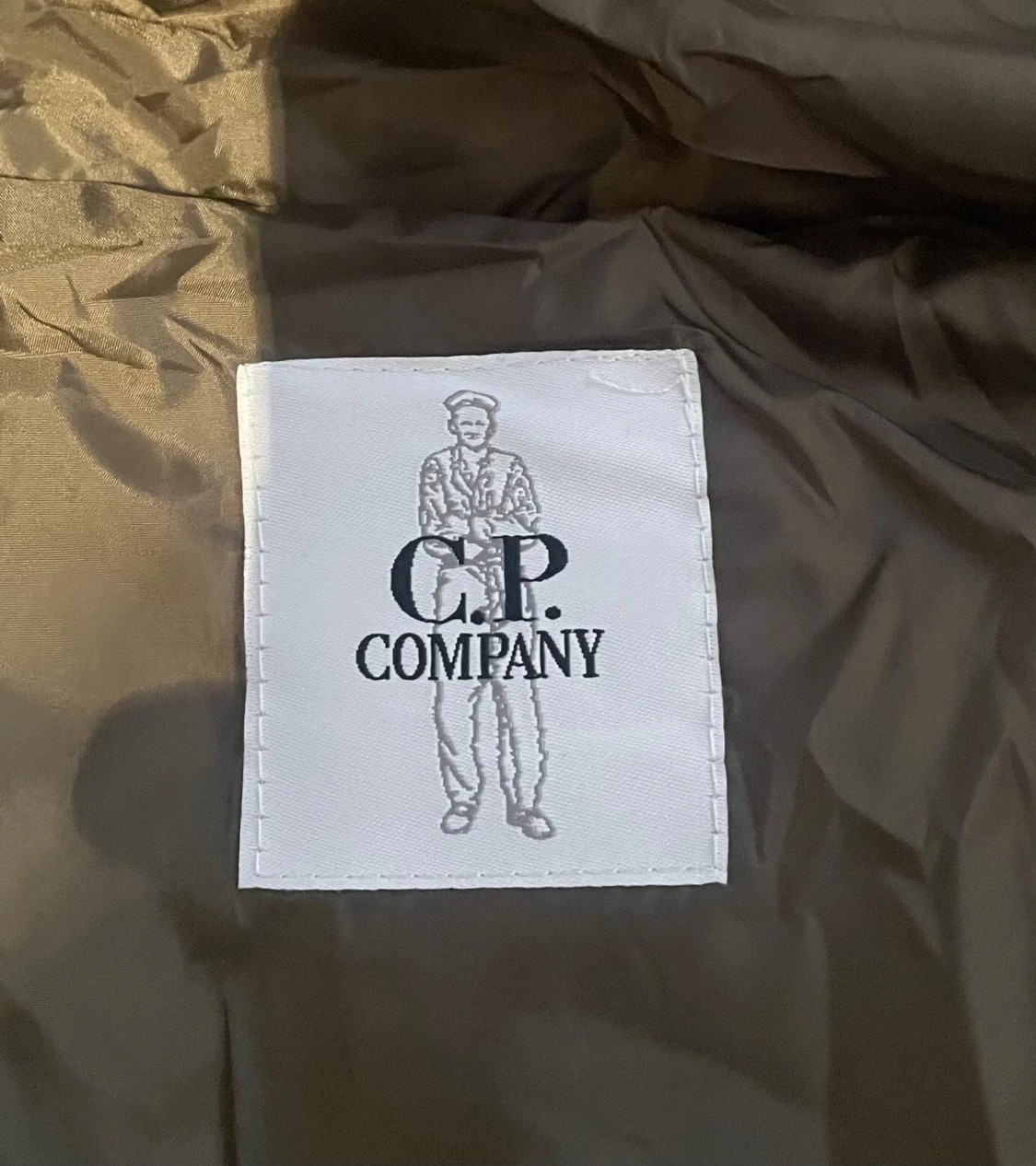 Olivgrön pufferjacka från C.P. Company - 5