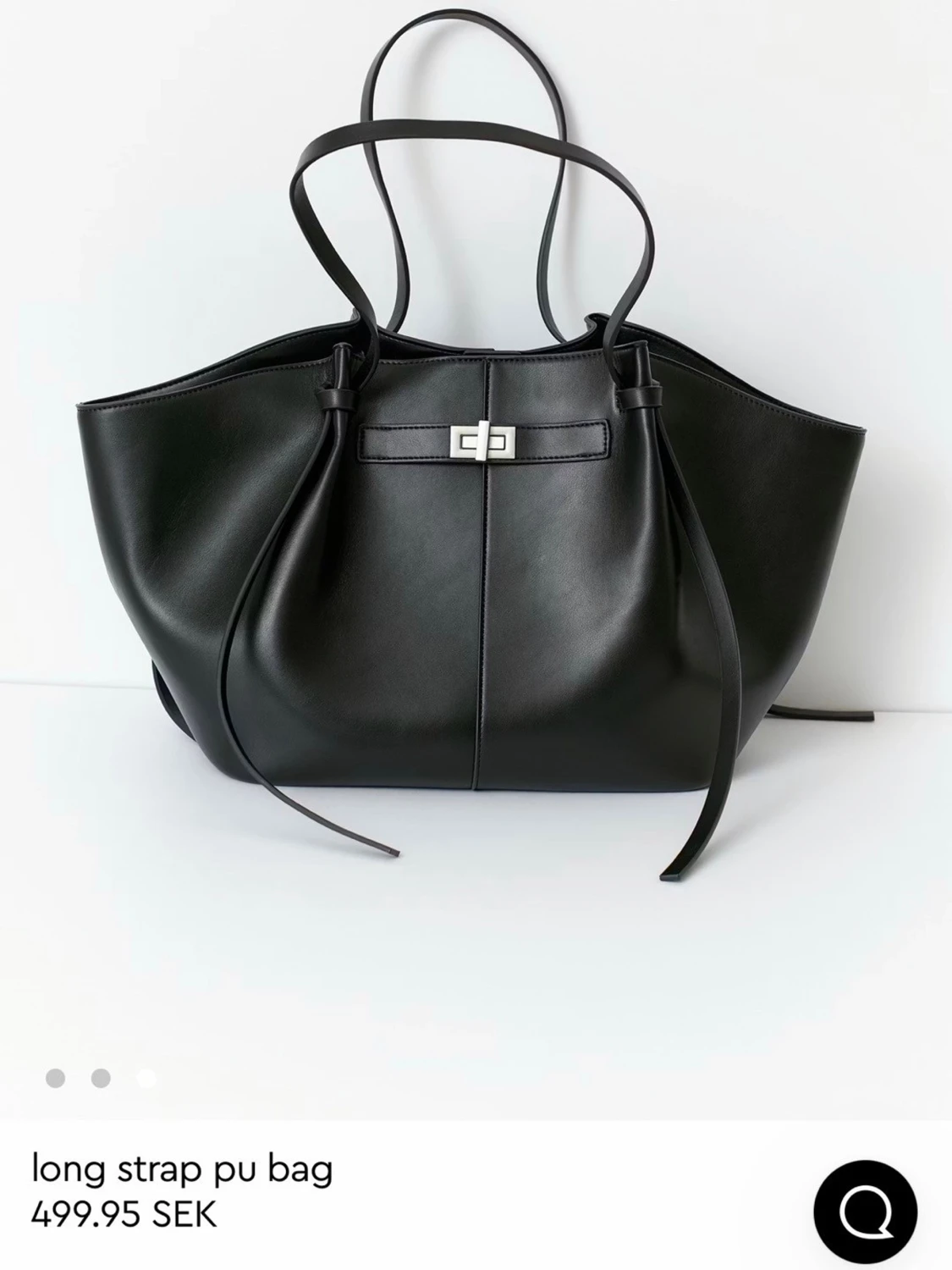 Svart axelväska med långa remmar