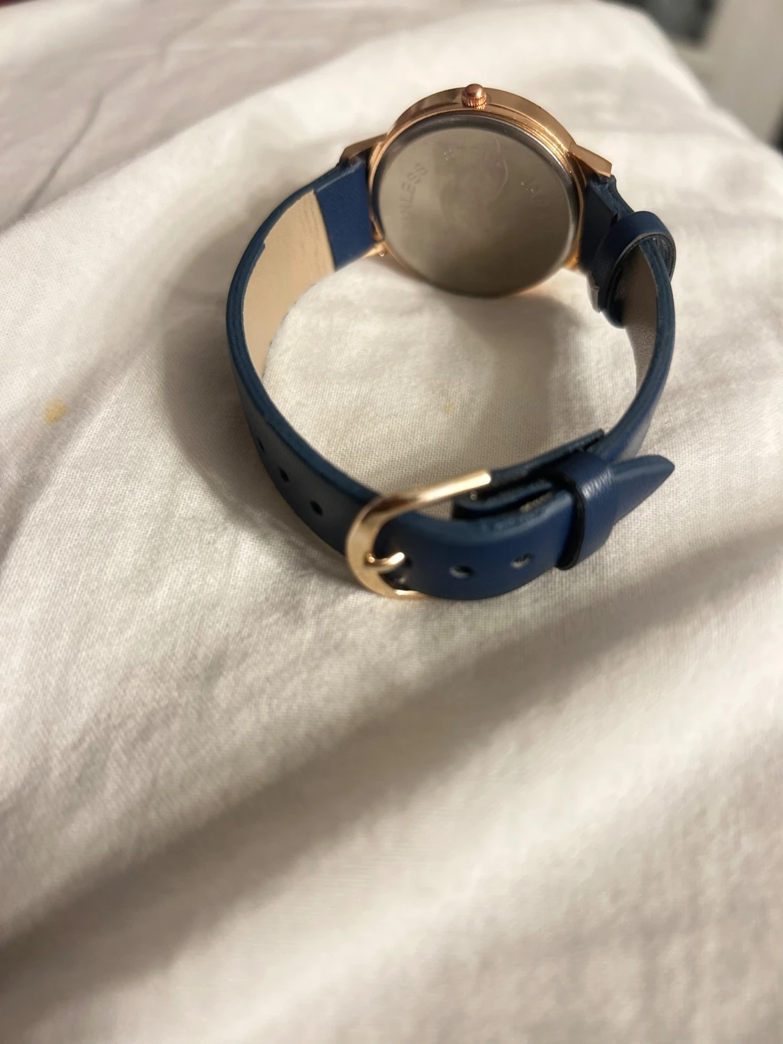 Blå klocka med guldfärgad boett - 4