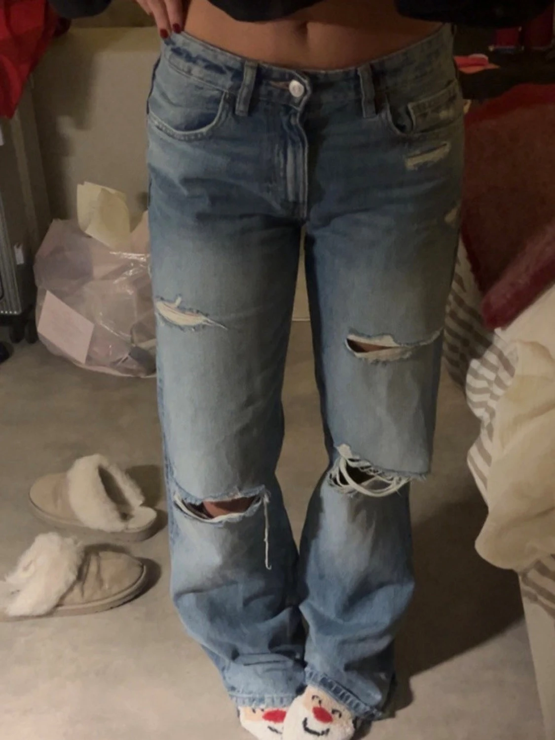 Lågmidjade ljusblå wide jeans med slitningar - 1