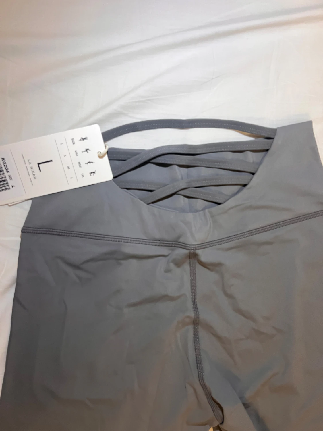 Grå leggings med korsade band - 1