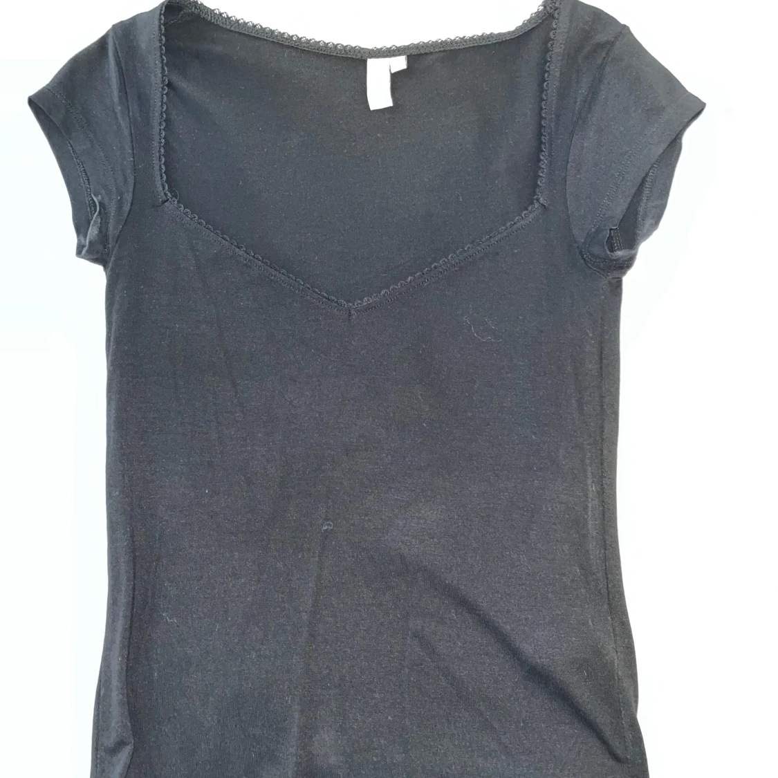 Svart kortärmad topp med spetsdetalj - 1