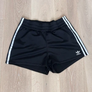 Adidas shorts - Adidas shorts in good condition. There is a small pocket on one side of the back!