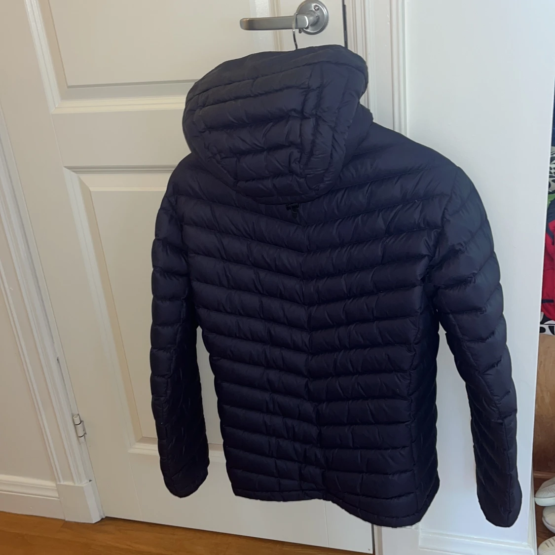 Mörkblå dunjacka Peak Performance S - 1