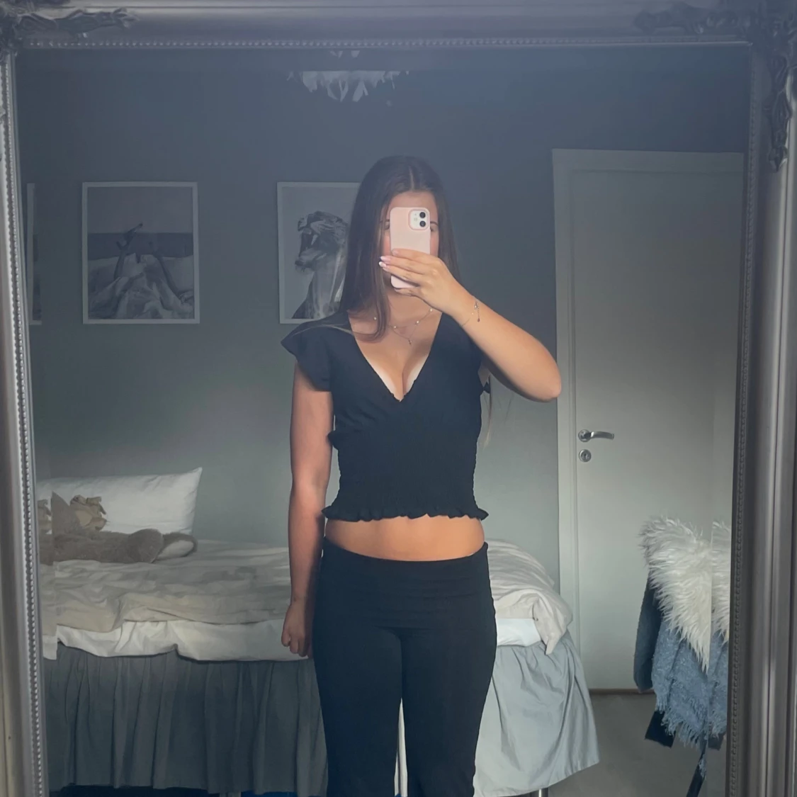 Svart v-ringad topp från Gina Tricot