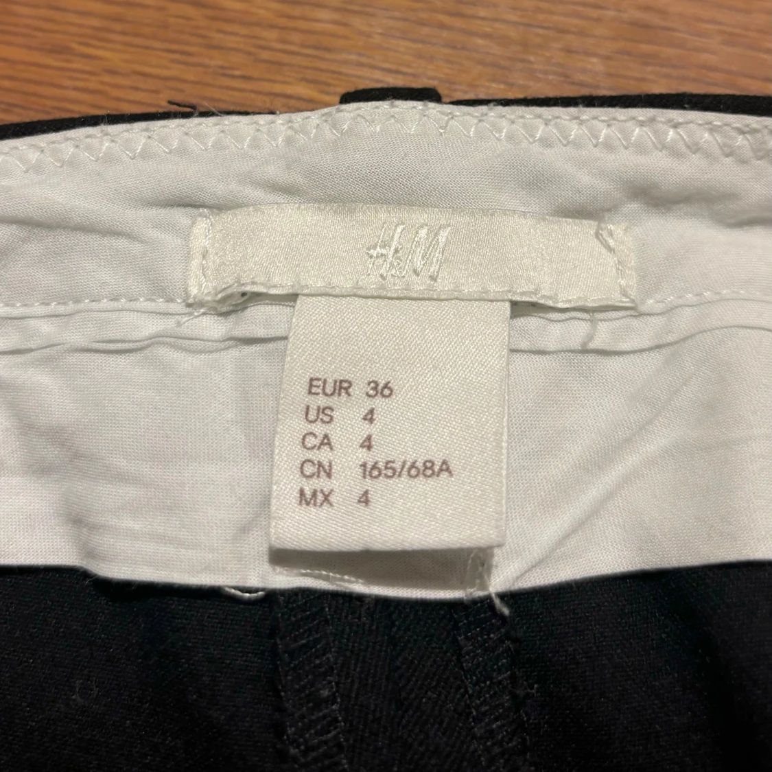 Lågmidjade svarta kostymbyxor med raka ben - 4