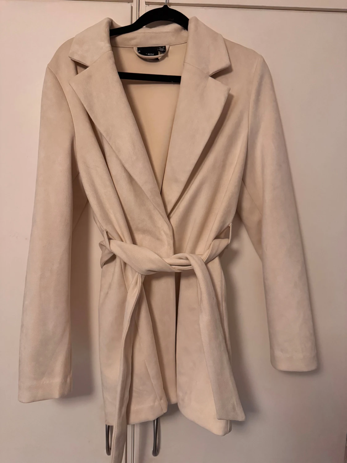 Beige kappa från Vero Moda XS