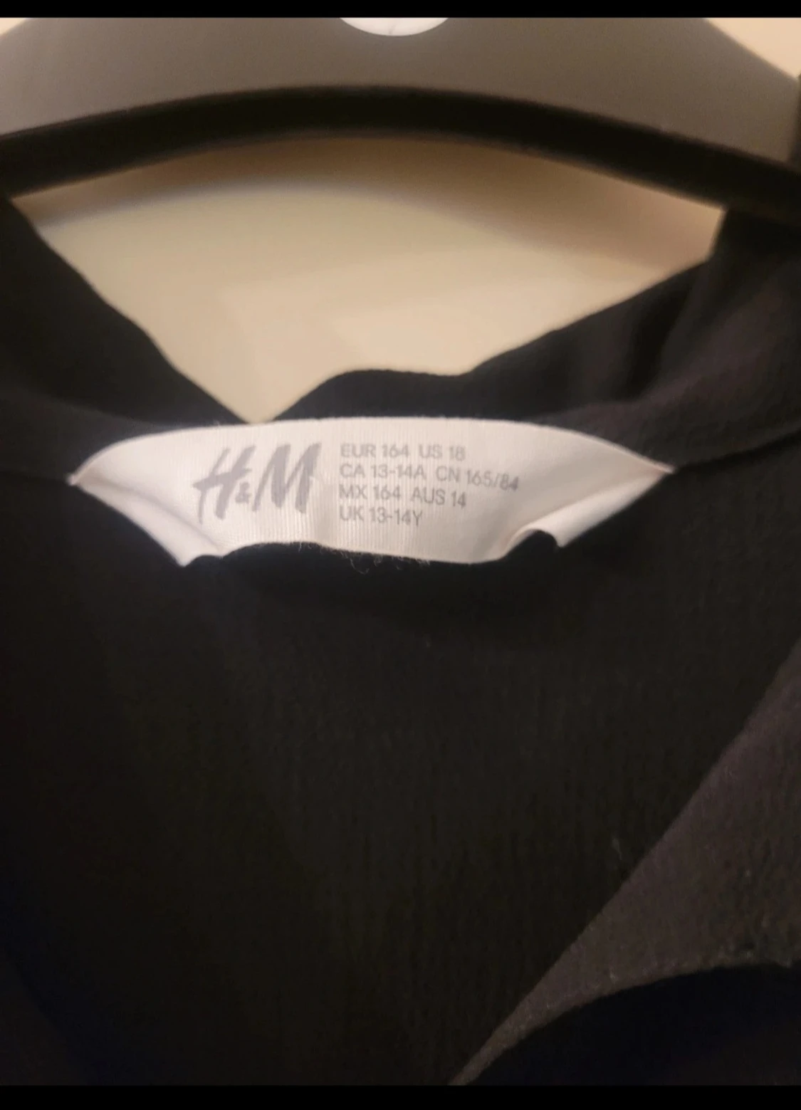 Svart volangklänning från H&M - 1