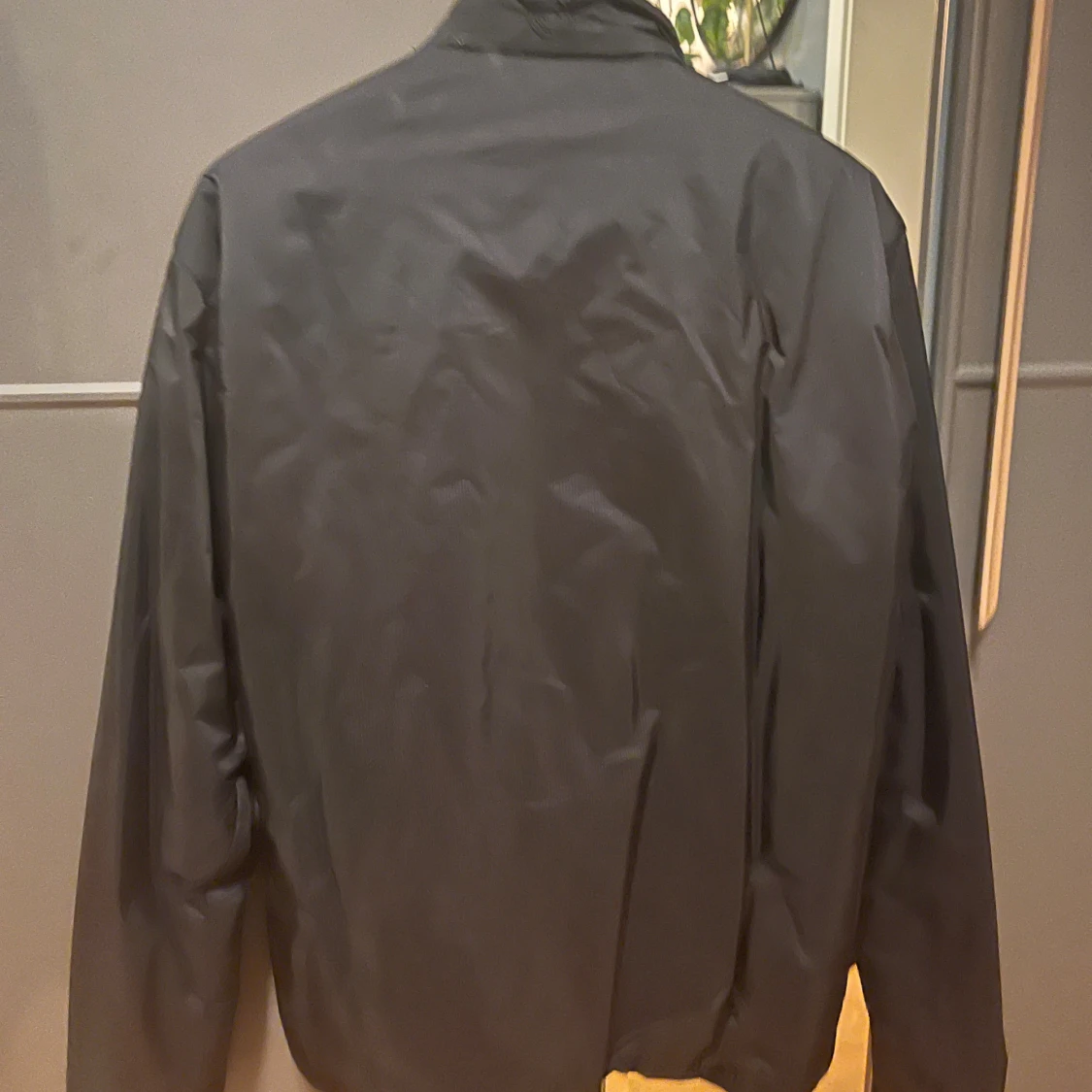 Svart vindjacka från Sail Racing XL - 1