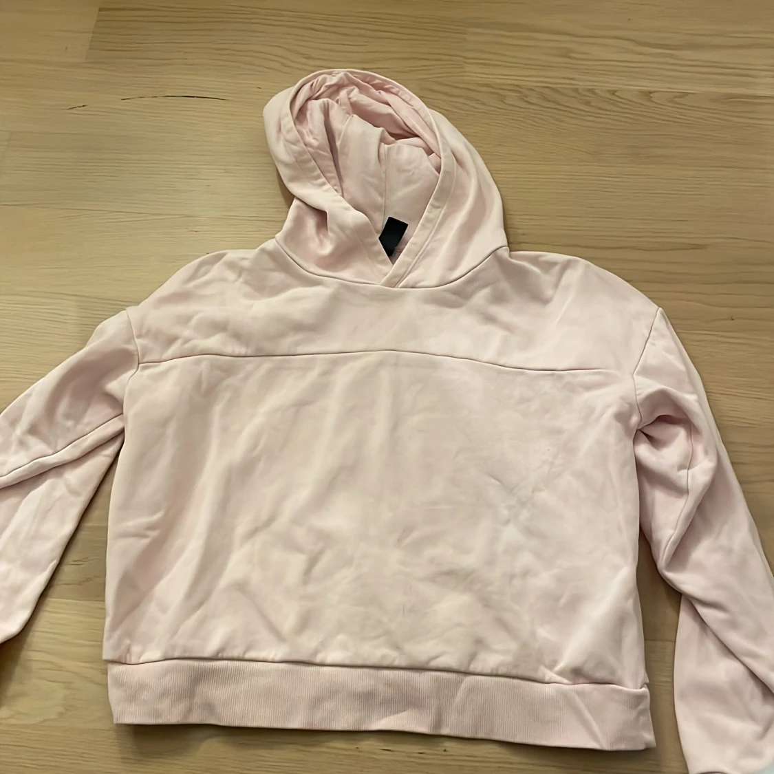 Ljusrosa hoodie från SOC