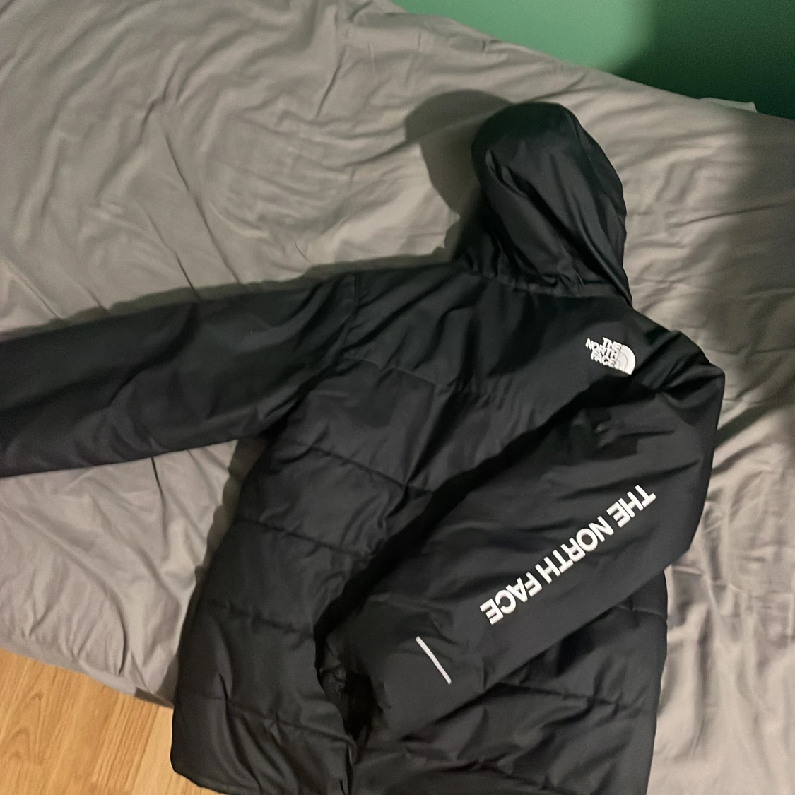 Svart pufferjacka från The North Face (14-16) - 1