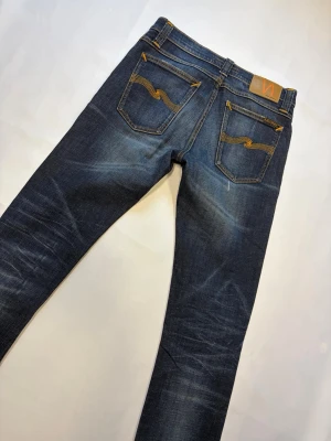 NUDIE JEANS ”JIMMY REPLICA” - Nudie ”Jimmy Replica”✔️Sjukt Feta Slitningar✔️W28 L32✔️Skriv vid minsta fundering✔️