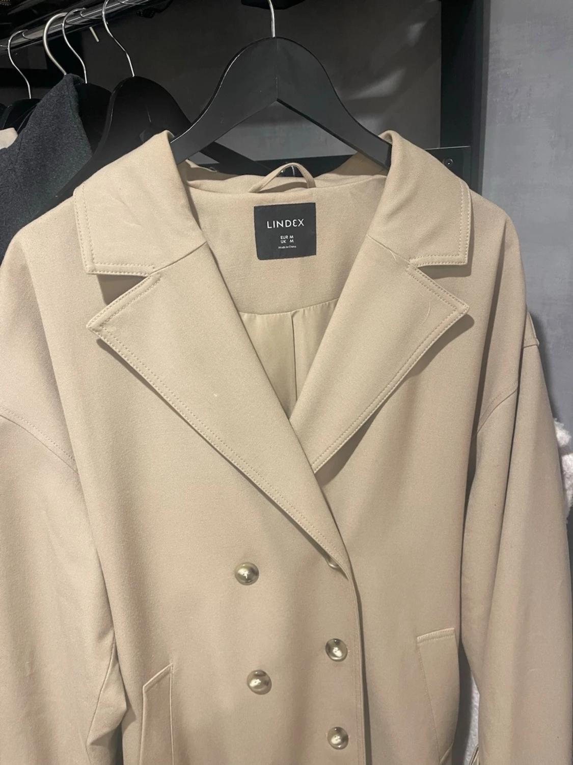 Beige kappa från Lindex