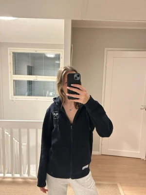 Hoodie with zipper - Team Finland in tennis