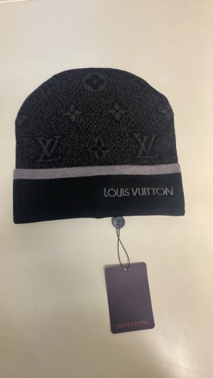 Black beanie - Item: Beanie / Hat Condition: New with tags Color: Black Size: One size Gender: Unisex  Description: Black knitted beanie. Soft and comfortable to wear, keeps your head warm. Simple everyday design with a folded cuff. Suitable for daily use.