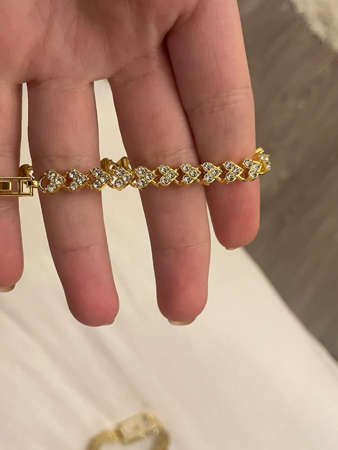 Guldigt tennisarmband med stenar - 1