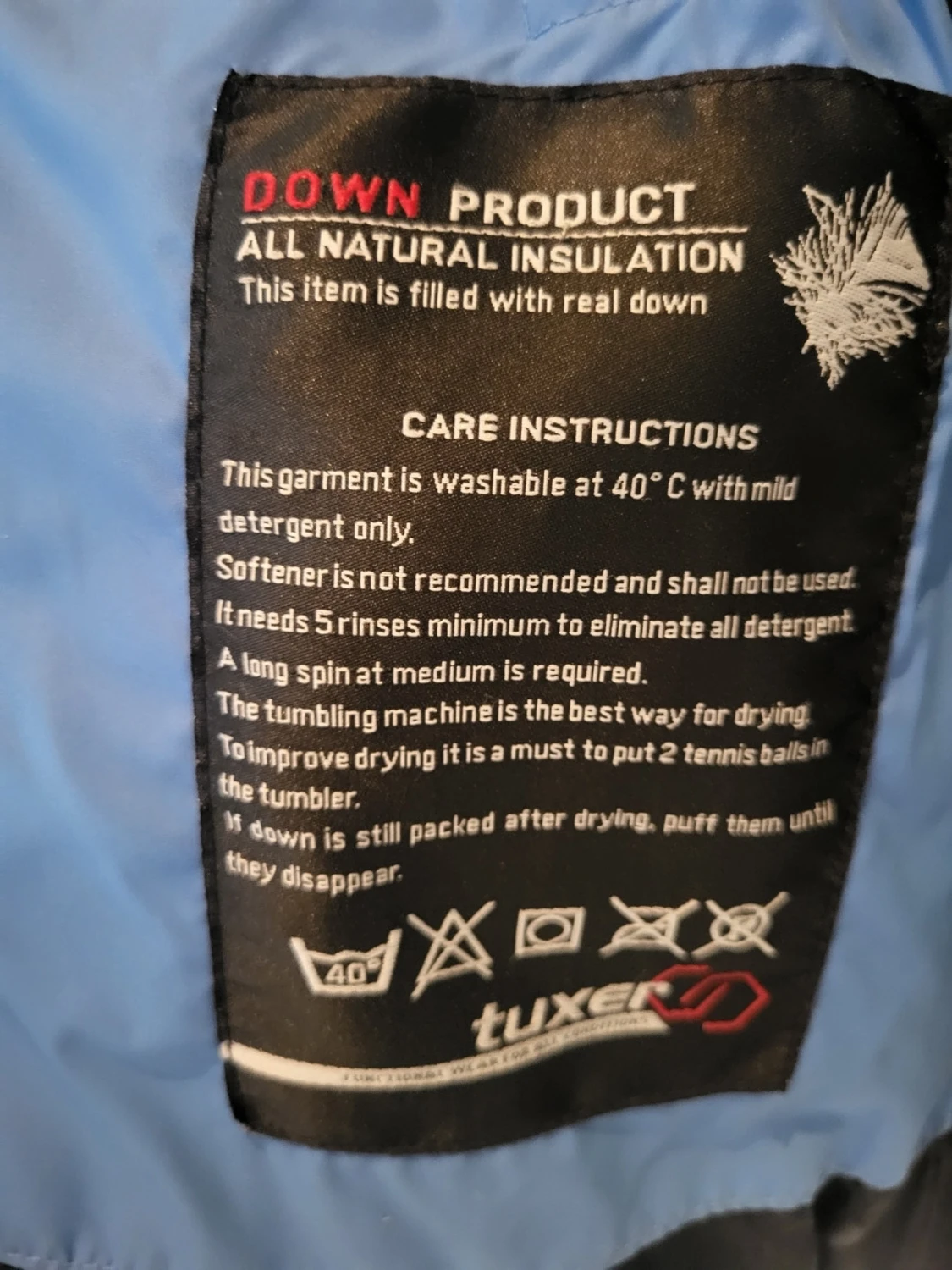 Blå dunjacka från Tuxer med huva - 1