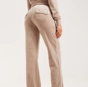 Beiga juicy byxor  - Juicy byxor i nyskick prövade bara en gång 