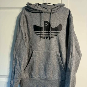 Grey Adidas skateboarding hoodie shmoo - Grey oversized adidas skateboarding hoodie colab ft Mark Gonzales shmoo. Barely used and fits S-XS since it is oversized.