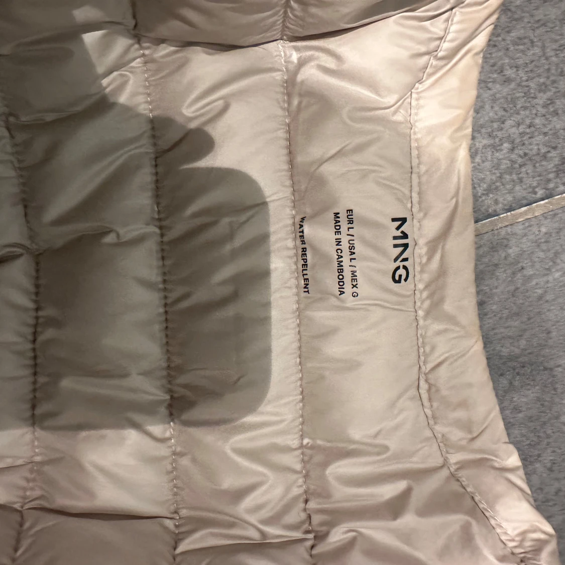 Cremevit dunjacka från Mango  - 3