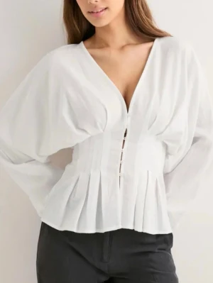 Topp - Storlek 36 från Nelly! 