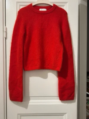 Mohai and wool jumper from H&M in XS size  - Never used jumper from H&M in XS size. Fabric has mohair 32% and wool 32%. Very warm and perfect for winters. Bought for 799kr last week.  This jumper has sleeves longer than usual which is a part for the style. Can be folded up to make a style. Total length of sleeves is 30inch long.  Please check my other listing to get bundle offer!