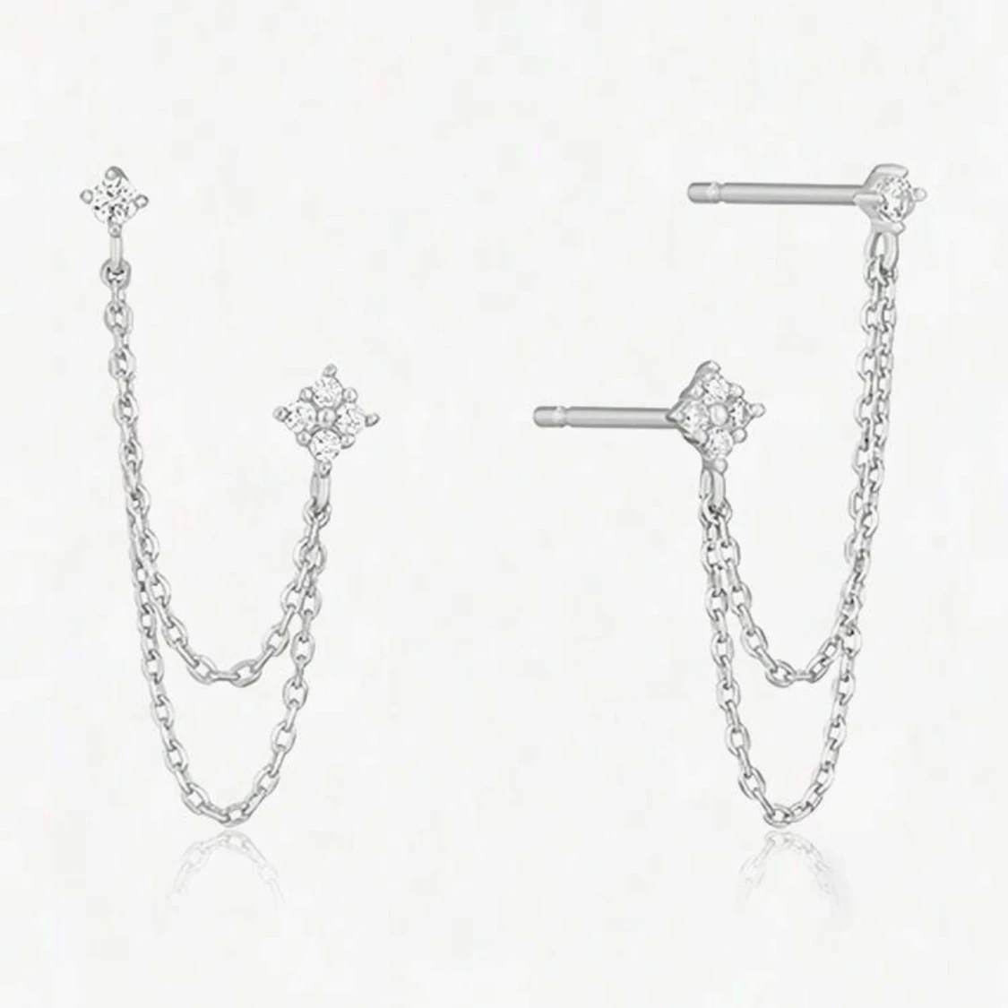 Silvriga örhängen med kedjor och stenar (inte använda)