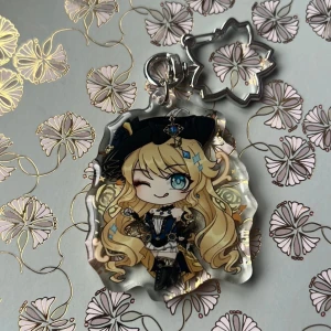Genshin impact Navia resin keychain - Keychain of Navia from Genshin Impact! Perfect for your bag decorations or collection :)  With resin on both sides making it look extra glossy!