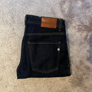 Blå jeans - Säljer ett par blå Hugo boss jeans i mycket bra skick | strl 30/32 