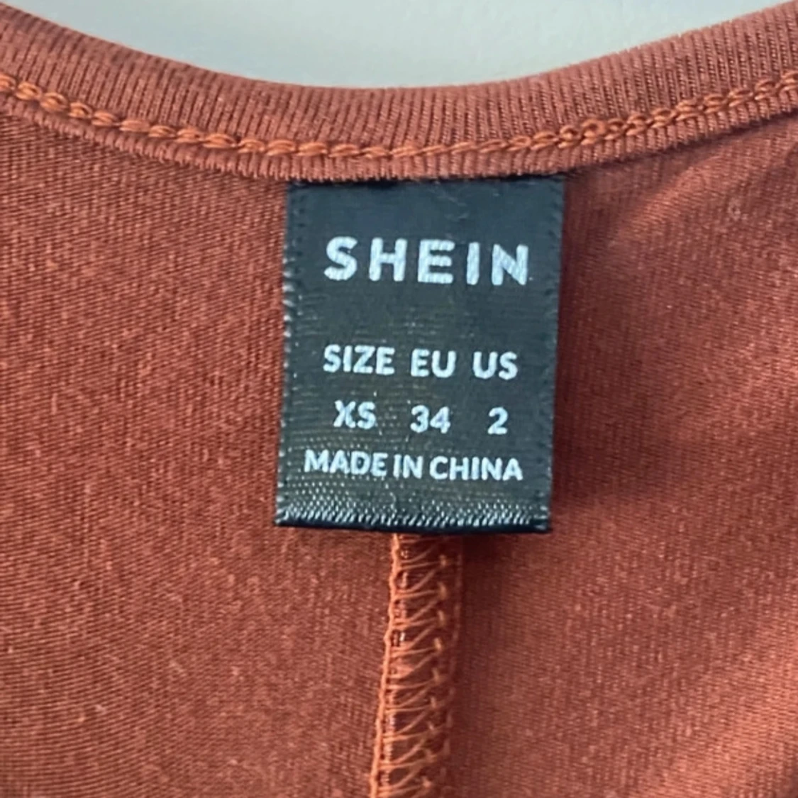 Brun långärmad jumpsuit  XS - 3