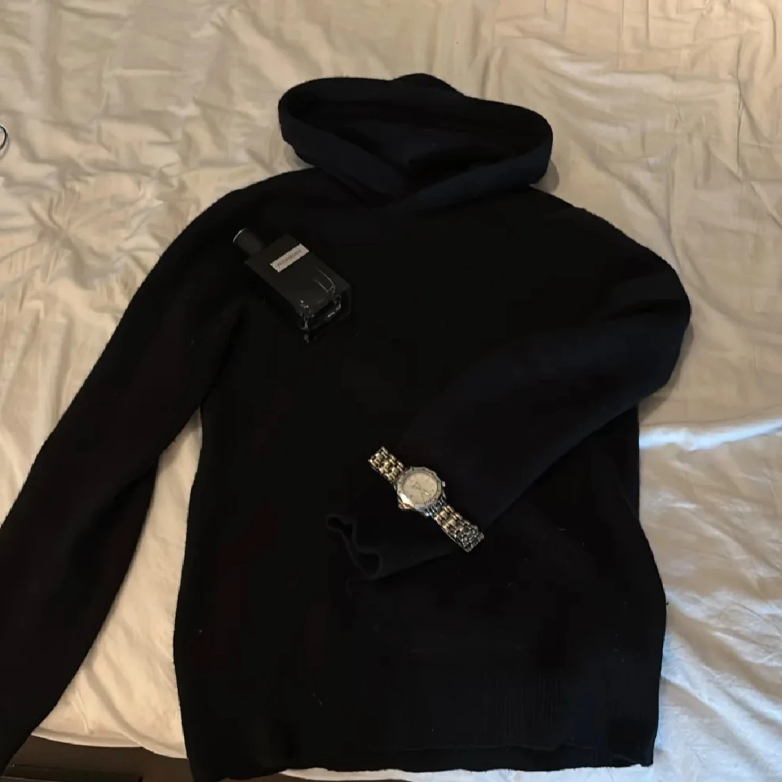 Svart hoodie i merinoull från Vailent XS