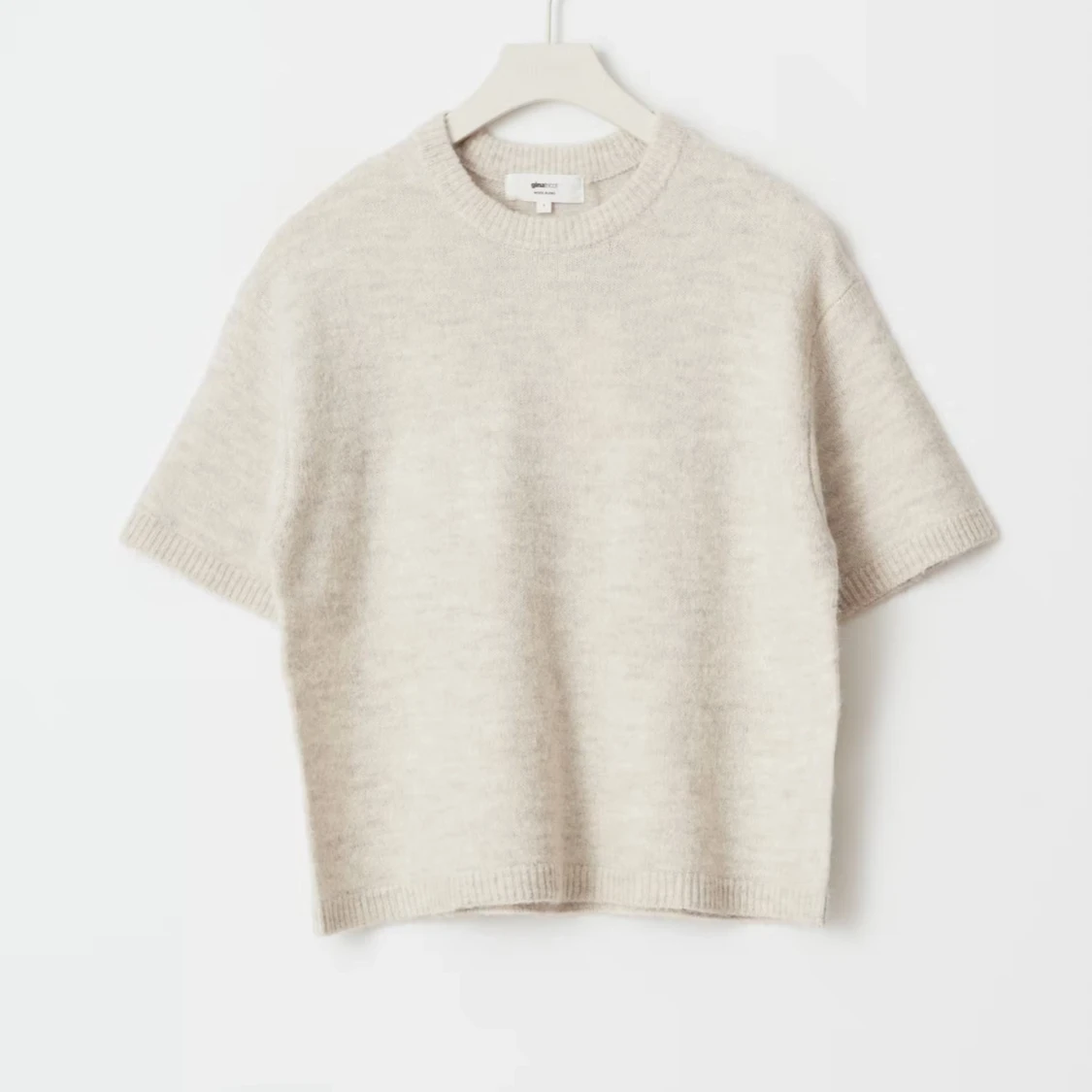 Beige stickad kortärmad tröja