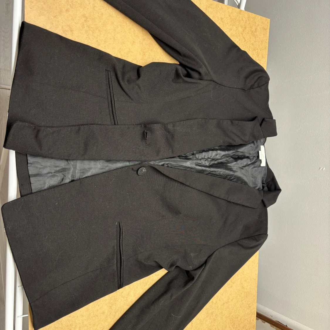 Svart kavaj från H&M, storlek 46