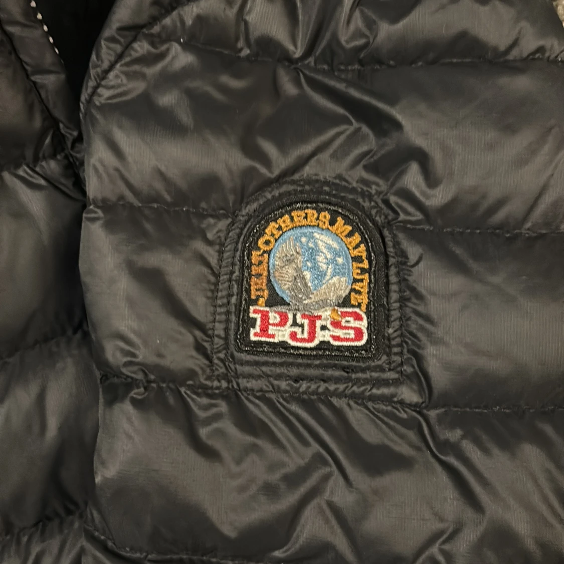 Svart dunjacka från Parajumpers L - 3