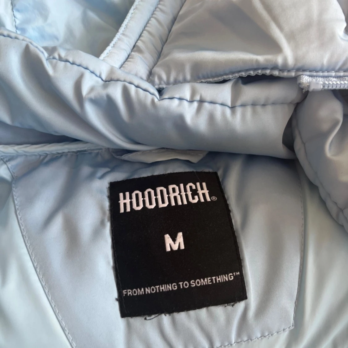 Ljusblå pufferjacka från Hoodrich - 92