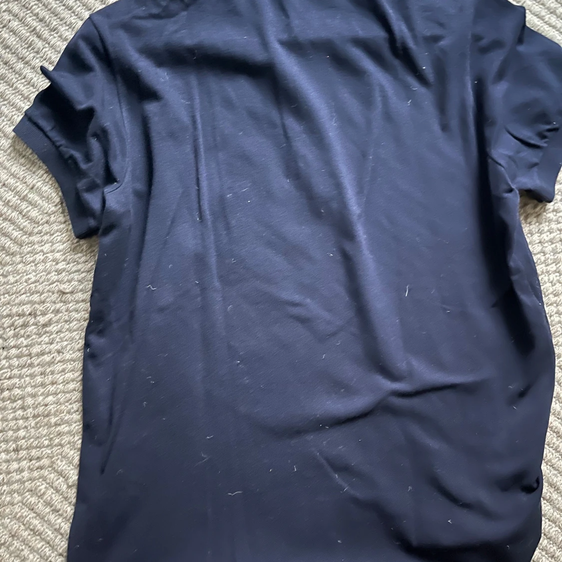 Marinblå pikétröja från Lacoste - 1