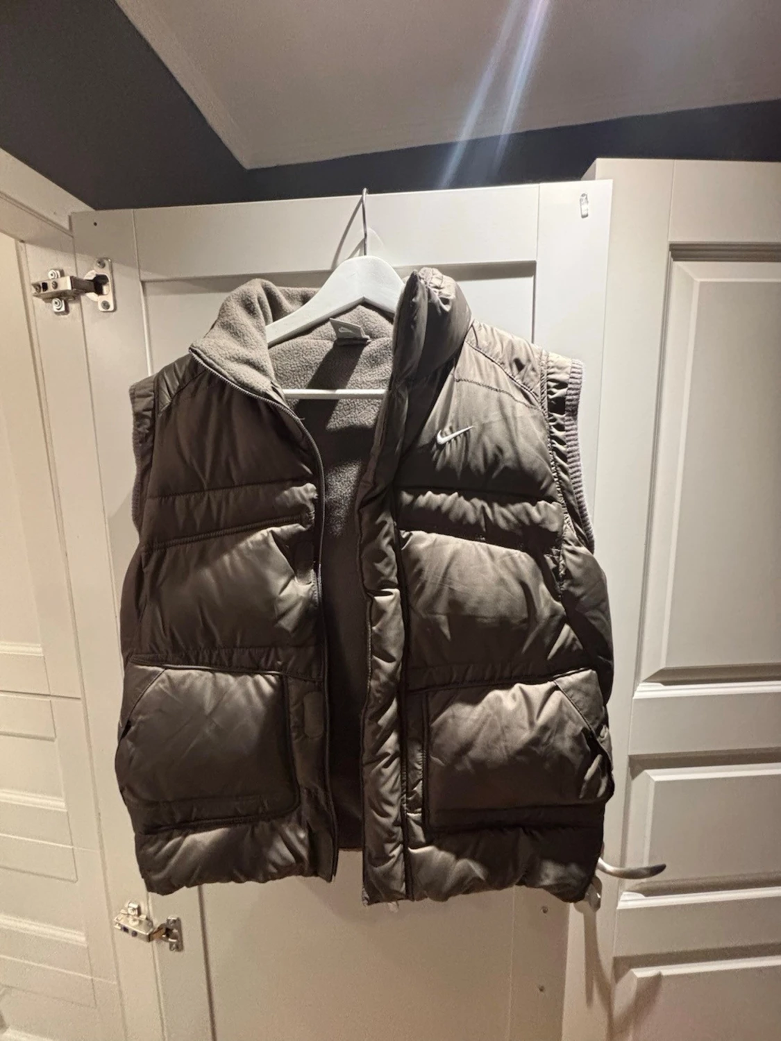 Brun dunväst från Nike, storlek L