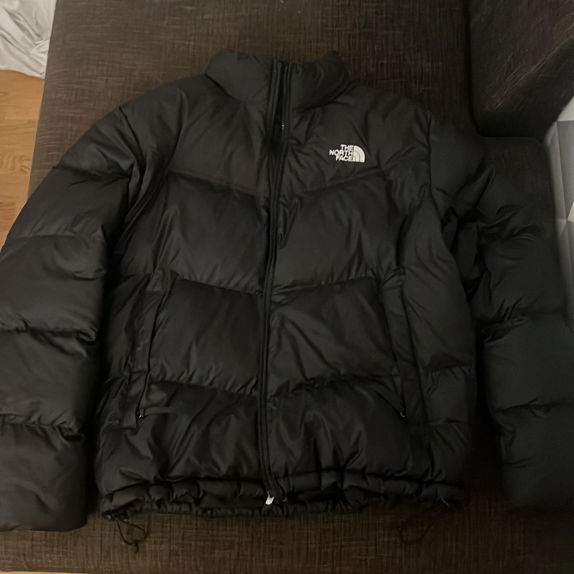 Svart pufferjacka från The North Face