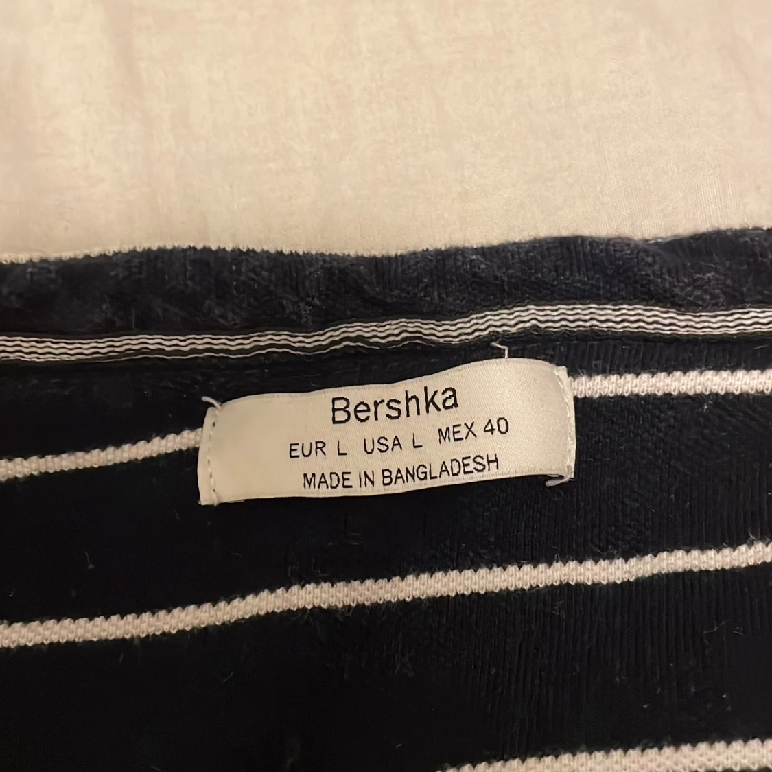 Blå/vit randig piké med knappar  - 1