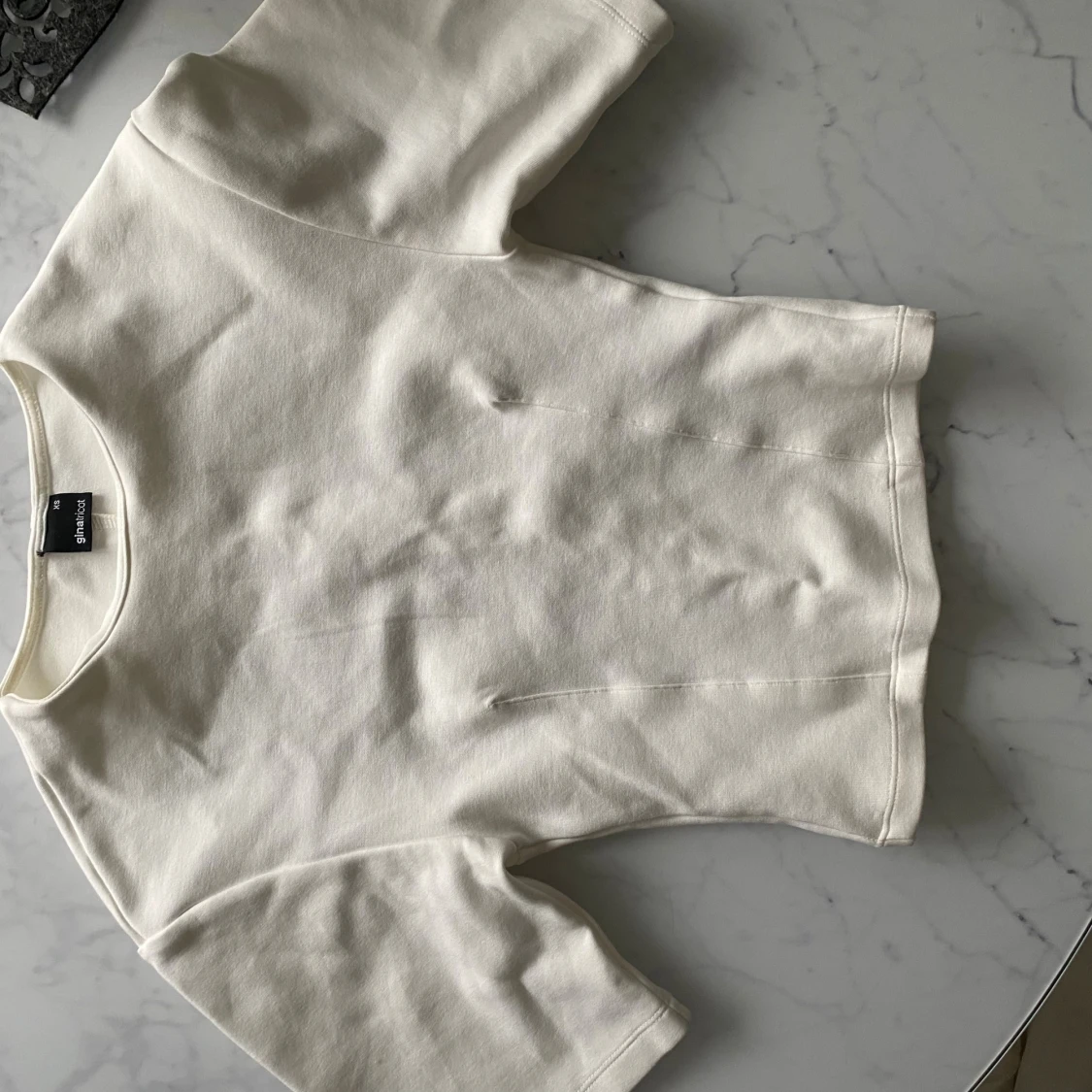 Vit kortärmad topp från Gina Tricot