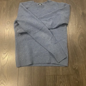 Blå stickad tröja från Uniqlo XS - Ljusblå stickad tröja ifrån uniqlo. Storlek Xs. 