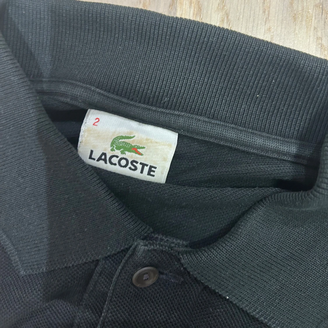 Svart pikétröja från Lacoste - 4